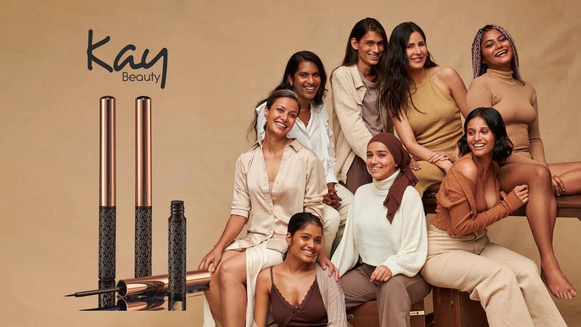 nykaa-kay-beauty-design-concept-before Kay Beauty brand slide Original Kay Beauty brand slide with a flat warm-tan background, the Kay Beauty script logo at top left, three eyeliner and mascara product shots displayed at varying angles in the lower-left corner, and a diverse group campaign photograph on the right, without full-bleed treatment or coordinated background color.