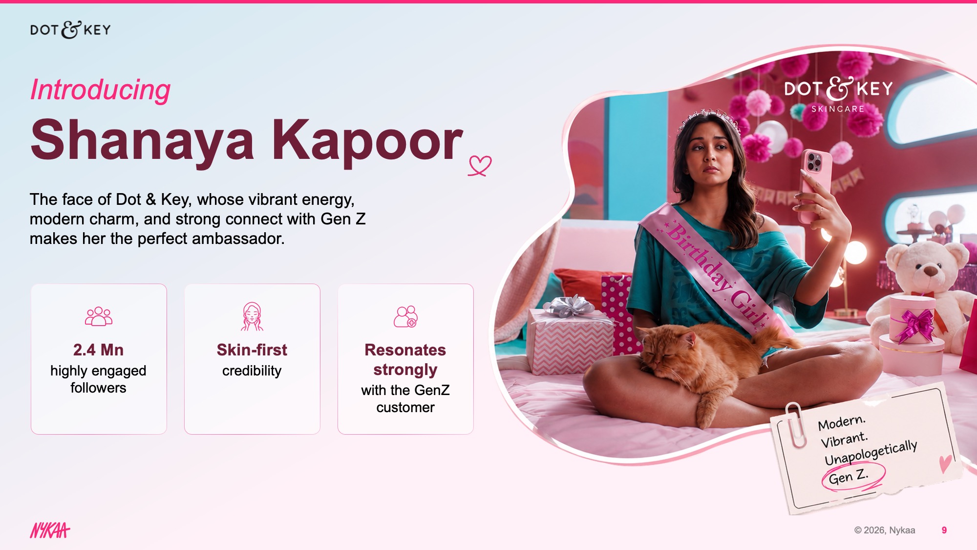 nykaa-shanaya-kapoor-design-concept-after Shanaya Kapoor ambassador slide Redesigned Dot & Key ambassador introduction slide using a soft blue-to-white gradient background, the Dot & Key logo at top-left, an italic "Introducing" subheading in pink above the ambassador name in large dark maroon type, a three-column stat card row below, and a campaign photograph of the ambassador inside a rounded-corner blob shape on the right, with a hand-written note card element in the lower corner.